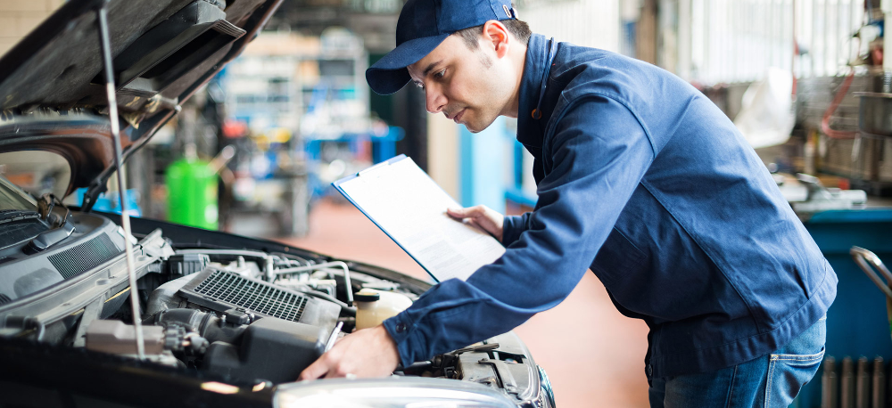Mechanic doing a service and checking a vehicle - Car Servicing Basford, Nottingham